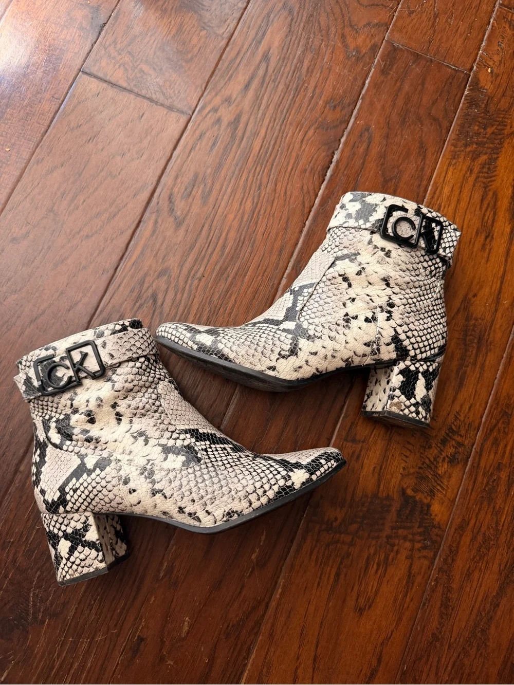 Calvin Klein Black & Ivory Snakeskin-Print Ankle Booties